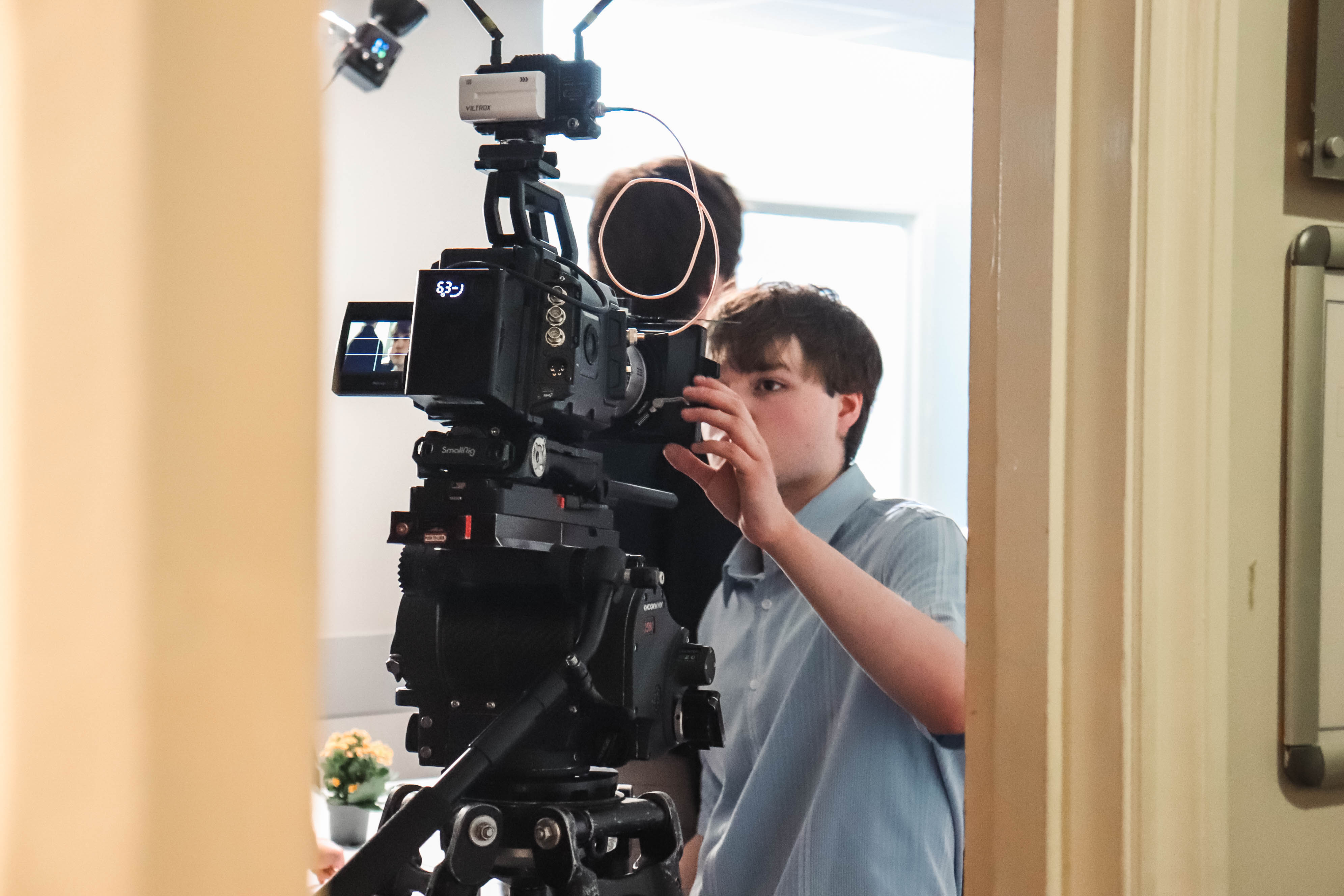 Film student with large camera